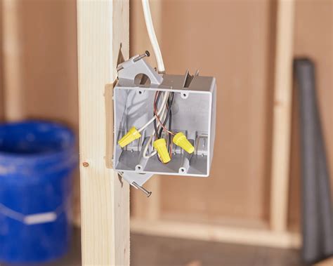 attaching an octogon electric box on a wall stud|connecting box to stud.